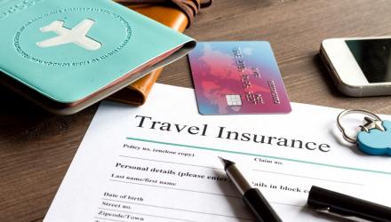 travel insurance papers and passport